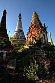 Inle Lake Myanmar. Indein, a cluster of ancient stupas  ruined and overgrown with bushes, just behind the village. 